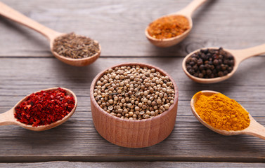 Spices mix on a grey wooden background. Top view