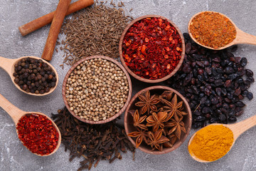 Spices mix on a grey background. Top view
