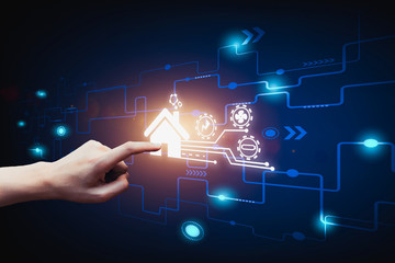The finger presses the command to the smart house, Smart home automation control system.