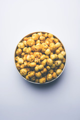 Roasted Phool Makhana or Crispy Lotus pops Seed served in a bowl, selective focus