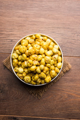 Roasted Phool Makhana or Crispy Lotus pops Seed served in a bowl, selective focus