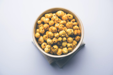Roasted Phool Makhana or Crispy Lotus pops Seed served in a bowl, selective focus