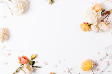 Festive flower composition on the white wooden background. Overhead view
