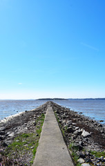Fototapeta na wymiar Stone pier in the sea in Sweden
