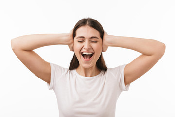 Fototapeta premium Close up of a young beautiful woman isolated