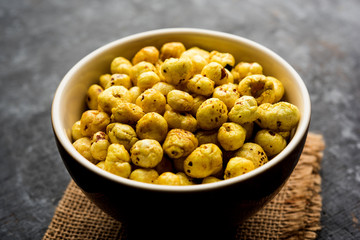 Roasted Phool Makhana or Crispy Lotus pops Seed served in a bowl, selective focus