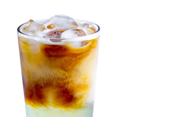 Isolated glass of cold cocktail with ice cubes on a white background. Cold drinks 