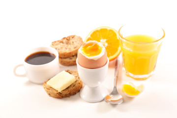 breakfast with egg, orange juice and coffee cup