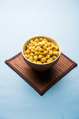 Roasted Phool Makhana or Crispy Lotus pops Seed served in a bowl, selective focus