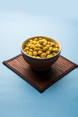Roasted Phool Makhana or Crispy Lotus pops Seed served in a bowl, selective focus