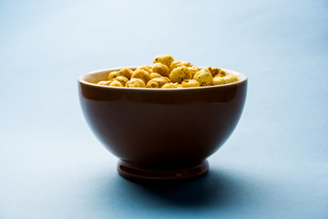 Roasted Phool Makhana or Crispy Lotus pops Seed served in a bowl, selective focus