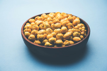 Roasted Phool Makhana or Crispy Lotus pops Seed served in a bowl, selective focus