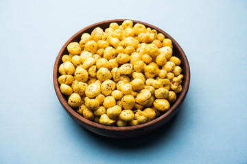 Roasted Phool Makhana or Crispy Lotus pops Seed served in a bowl, selective focus