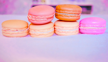 Colorful macaroon with color background, Macaron Candy cookies in bakground.