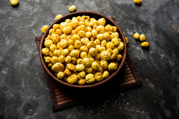 Roasted Phool Makhana or Crispy Lotus pops Seed served in a bowl, selective focus