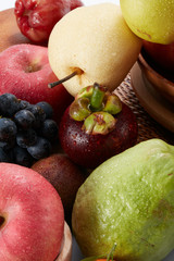 Closeup, a wide variety of fruits background
