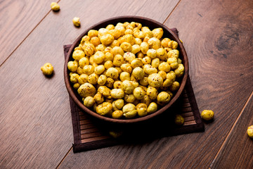 Roasted Phool Makhana or Crispy Lotus pops Seed served in a bowl, selective focus