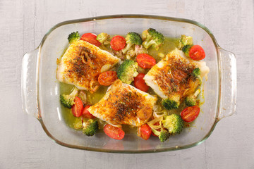 baked fish with spice and vegetable