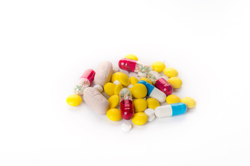 Background of assorted pharmaceutical capsules and medication in different colors,