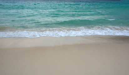 Fototapeta na wymiar Tropical Sandy Beach Under The Cloudy Sky, Sea Shore