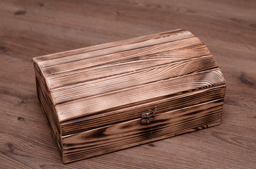 Vintage wooden luxury gift box or casket on wood background