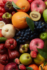 Closeup, a wide variety of fruits background

