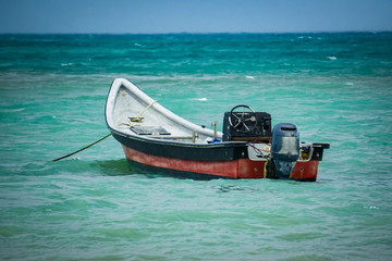 Small boat in the ocean