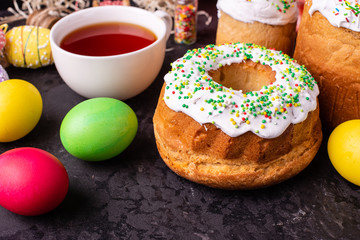 Easter, cake, eggs, holiday. Easter cake and colorful eggs on a dark background. It can be used as a background