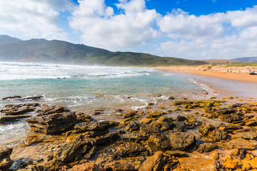 Waves in Porto Ferro beach shore