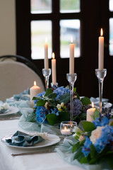 decorated table in the restaurant for a wedding dinner