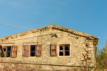 Broken glass of a window in an abandoned house