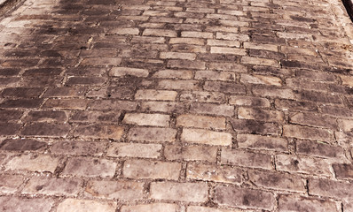 Fototapeta na wymiar Detail of a paved street in Montmartre neighborhood