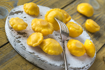 Pattypan squash on the wooden board