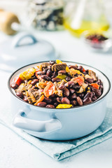 Beef and bean stew in a pot. Selective focus, space for text.