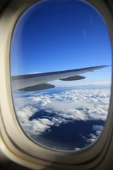 飛行機から見る湧き上がる雲