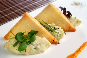 Italian food recipes, stockfish brandade with toasted bread.