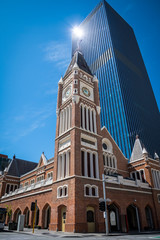 Perth Town Hall in Western Australia old brick building in front of modern skyscraper