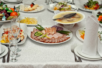 delicious dishes on the table in the restaurant. serving table.