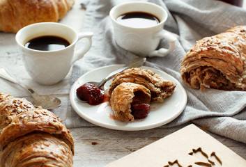 Breakfast with coffee and croissant