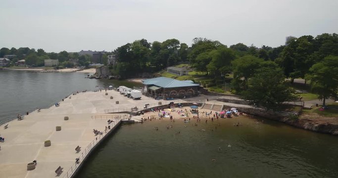 People on the Sandy Beach Shore of Glen Island in New Rochelle