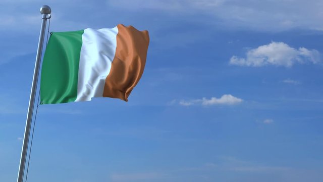 Commercial airplane landing behind waving Irish flag. Travel to the Republic of Ireland conceptual animation