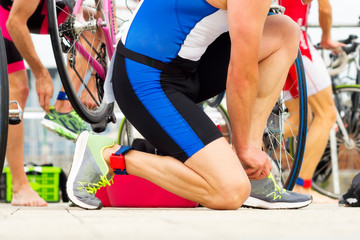 triathlon competitors in ciclyng , cyclist in action and motion