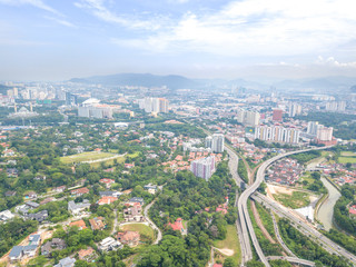 Fototapeta premium KUALA LUMPUR, MALAYSIA - AUGUST 19, 2017: Aerial view of metropilitan city at daylight.