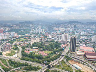 KUALA LUMPUR, MALAYSIA - AUGUST 19, 2017: Aerial view of metropilitan city at daylight.