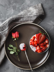 yogurt, strawberry dessert and granola