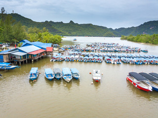 LANGKAWI, MALAYSIA - SEPTEMBER 15, 2017: Boats parking at jetty Tanjung Rhu Beach.