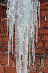 Very large and dangerous icicles in close up