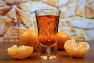 Mandarine napoleon liqueur in shot glass