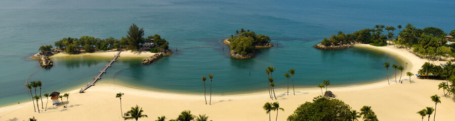 view to a small lagoon at Siloso beach on Sentosa island, Singapore