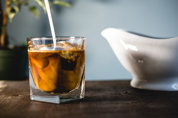Pouring milk and coffee